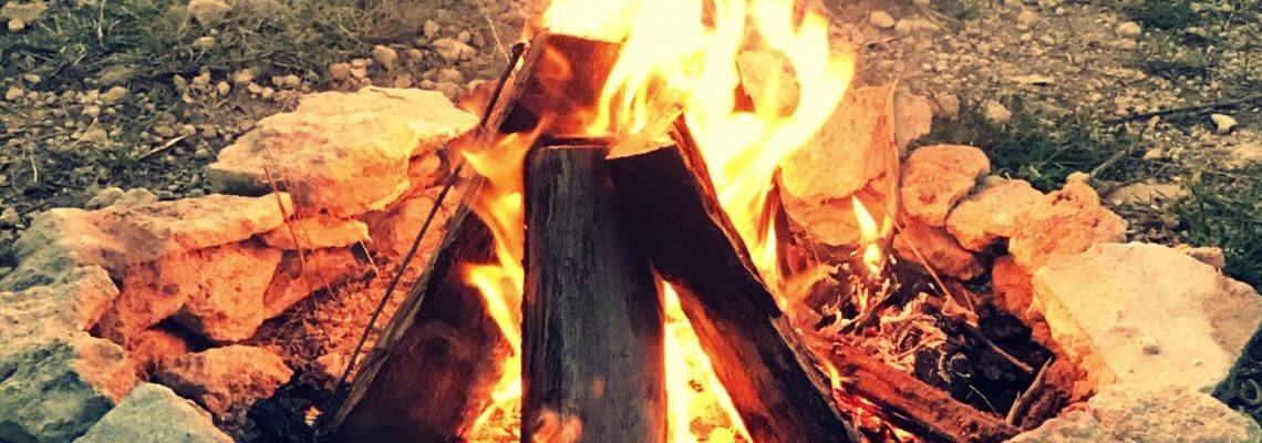 Campfire surrounded by stone circle