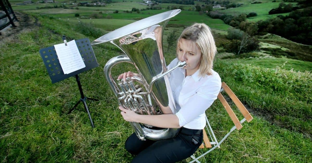 Woman playing a bass on the moors