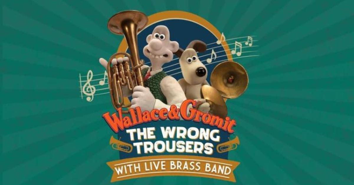 A picture of the animated pair Wallace and Gromit holding brass instruments. Text reads: Wallace and Gromit The Wrong Trousers With Live Brass Band