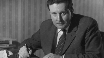 A black-and-white landscape photo of Malcolm Arnold