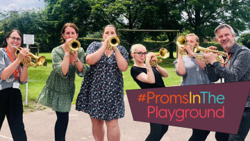 Five teachers hold their cornets 