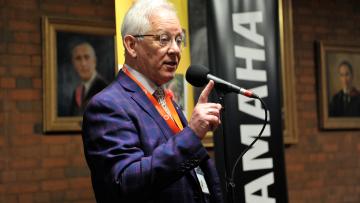 Photo of David Hayward compering at an event