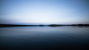 Landscape picture of a lake and blue sky