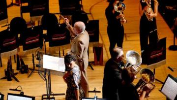 Arial view of a brass concert, with Allan Withington in the centre