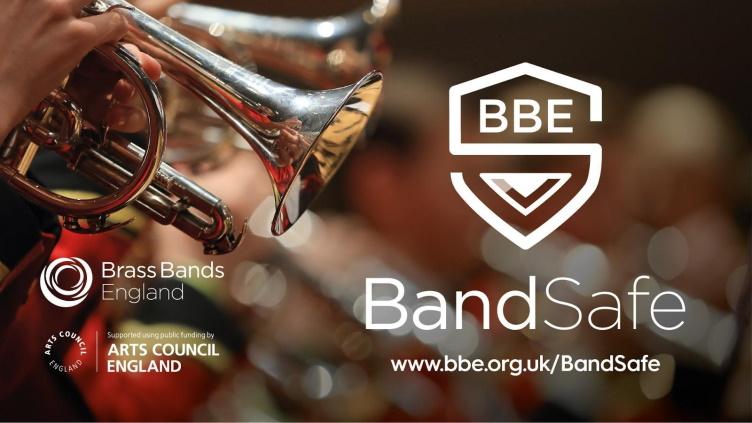 BandSafe logo of an S shaped like a shield, next to a cornet being played