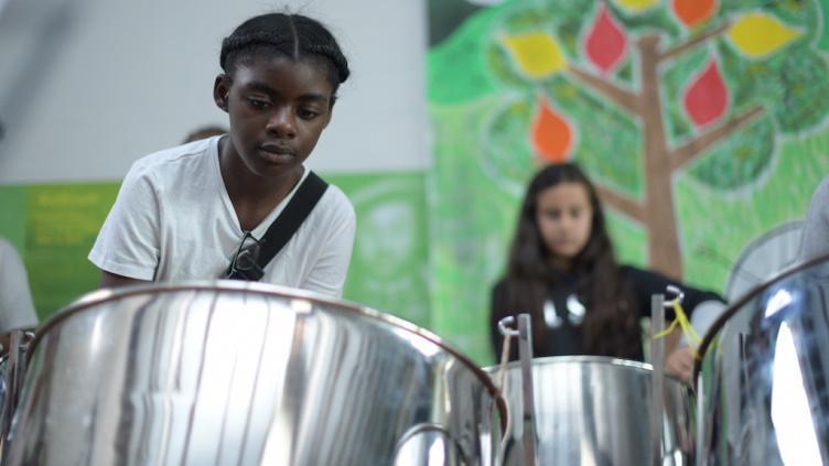 Picture of children playing steel drums